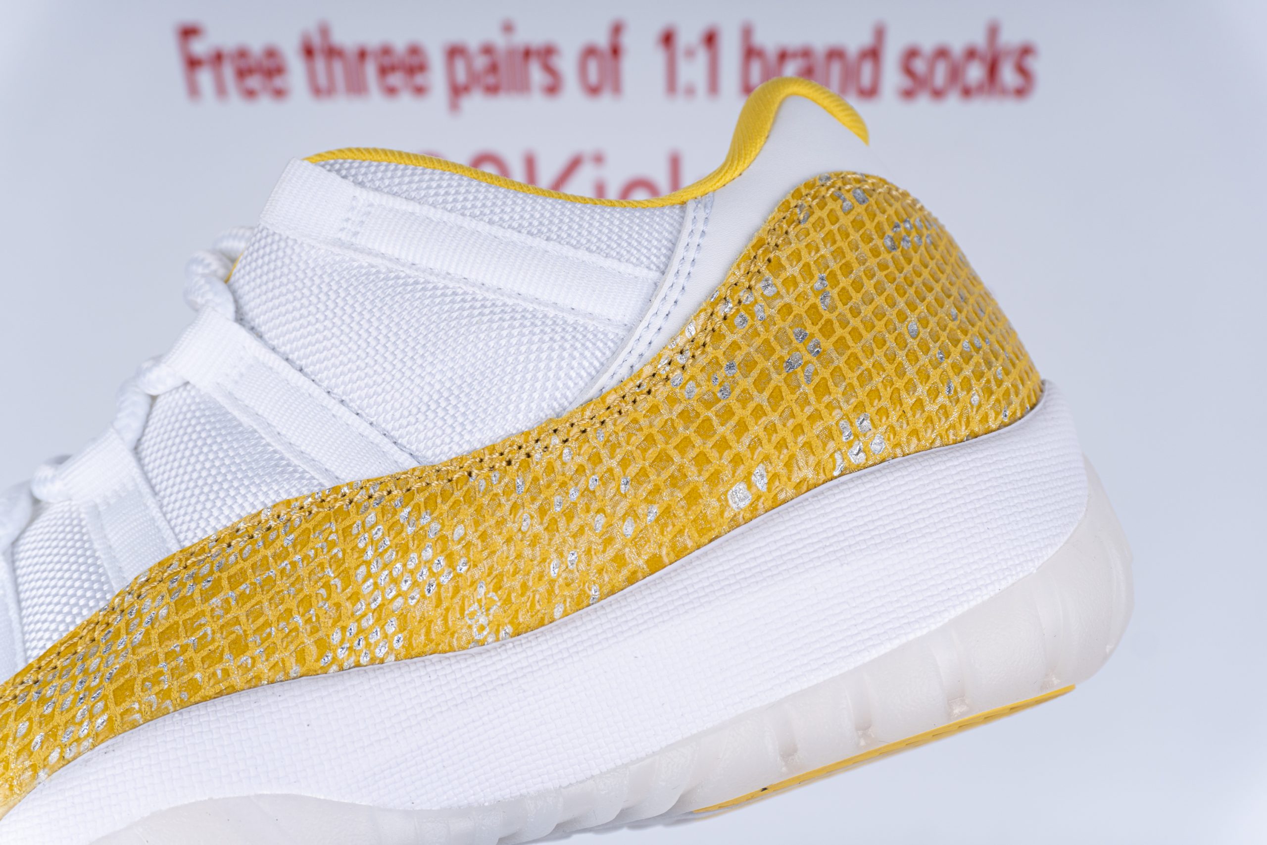 Jordan 11 Retro Low Tour Yellow Snakeskin